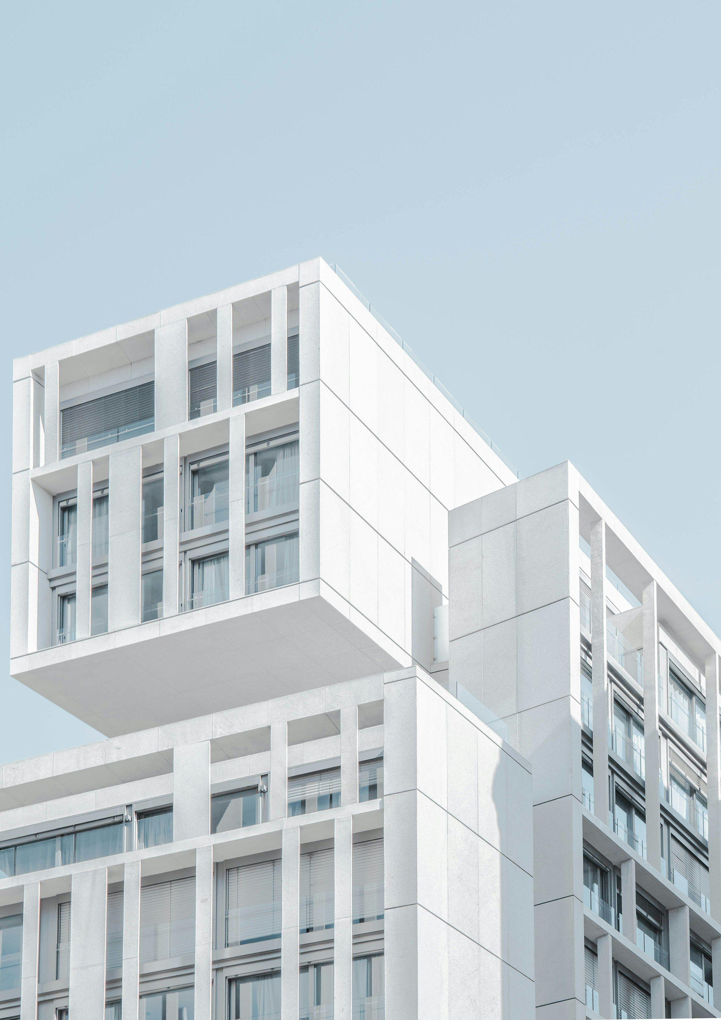 The stepped white facade of the Unit workshop and laboratory in Basel