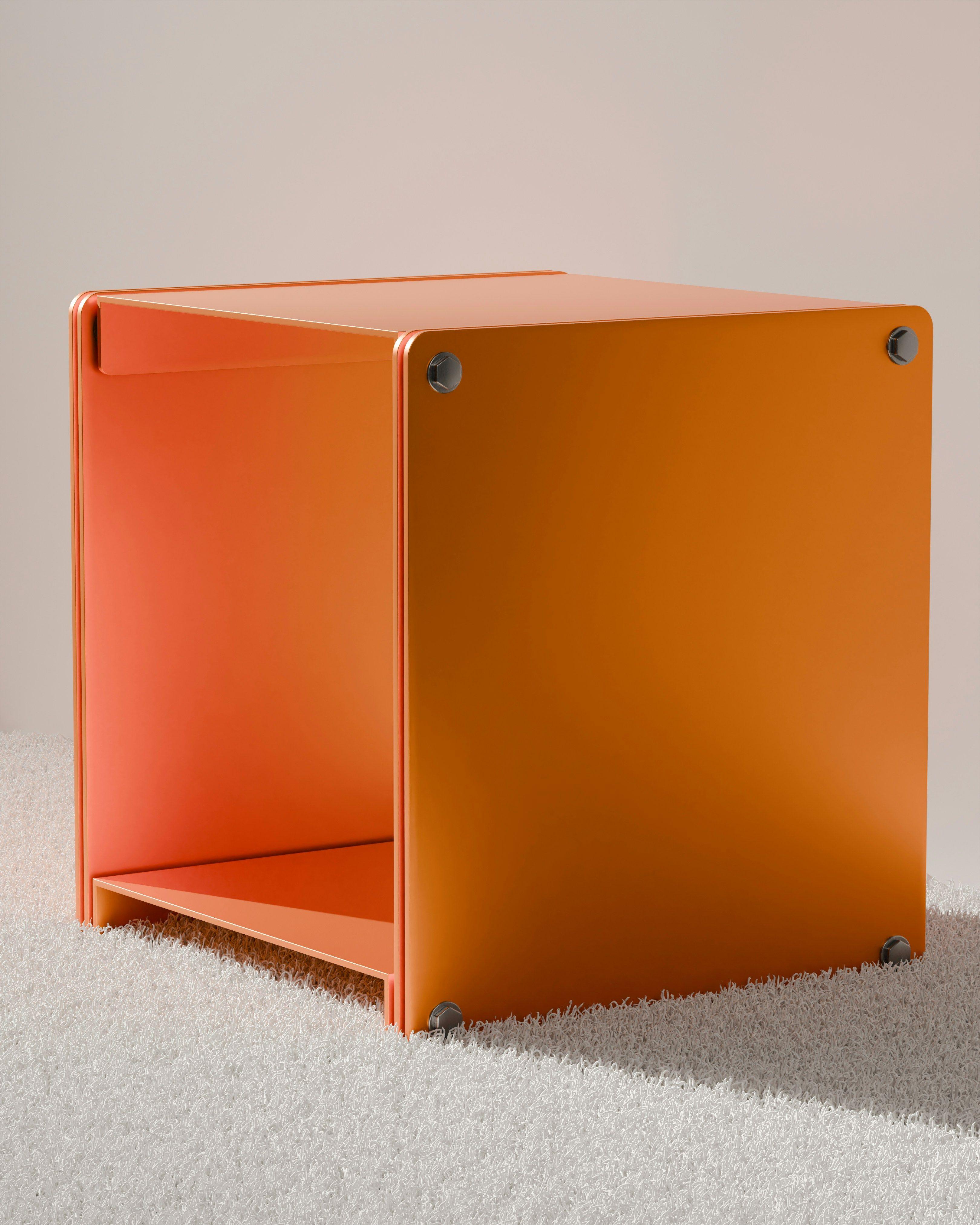 Unit cube stool in signature orange powder-coated steel