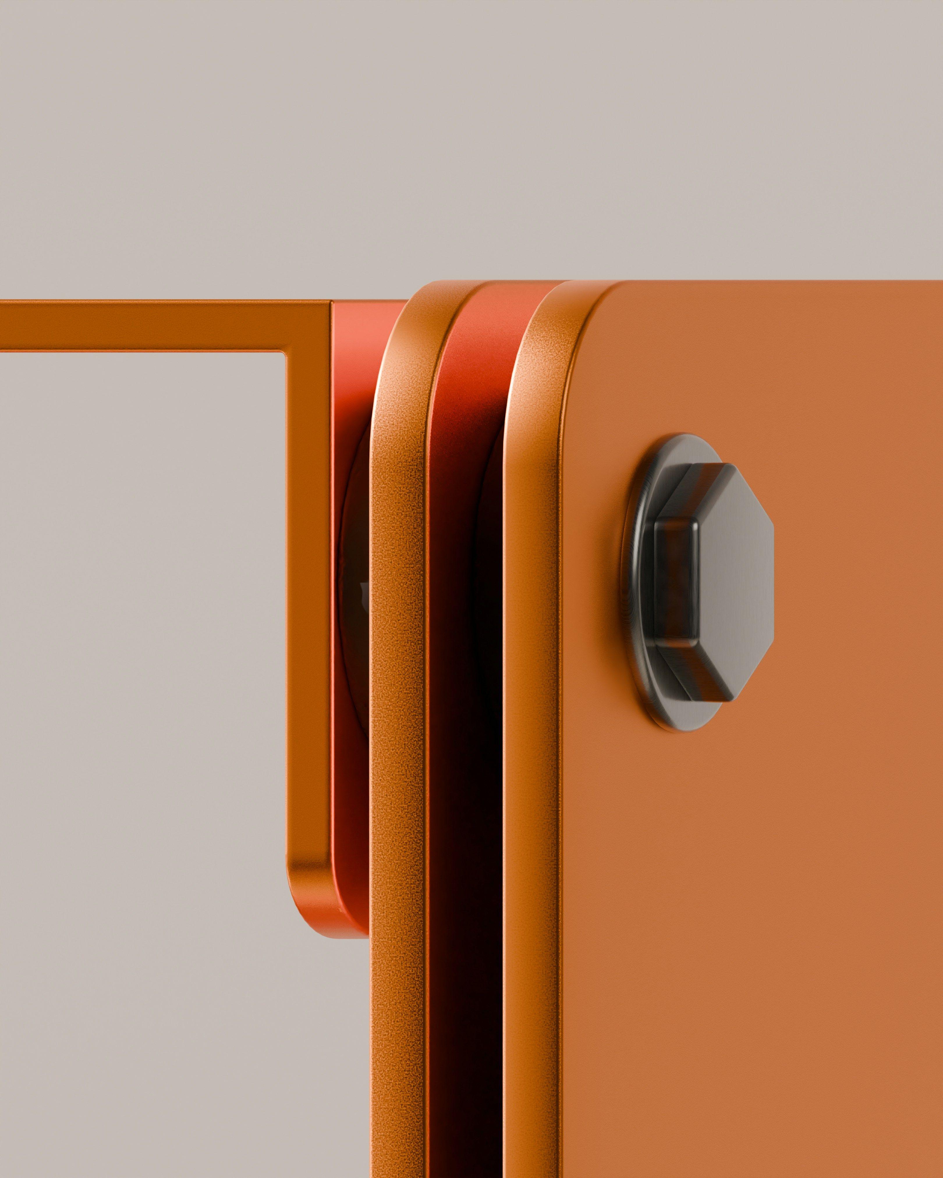 Close detail of a rounded orange panel edge and fixing