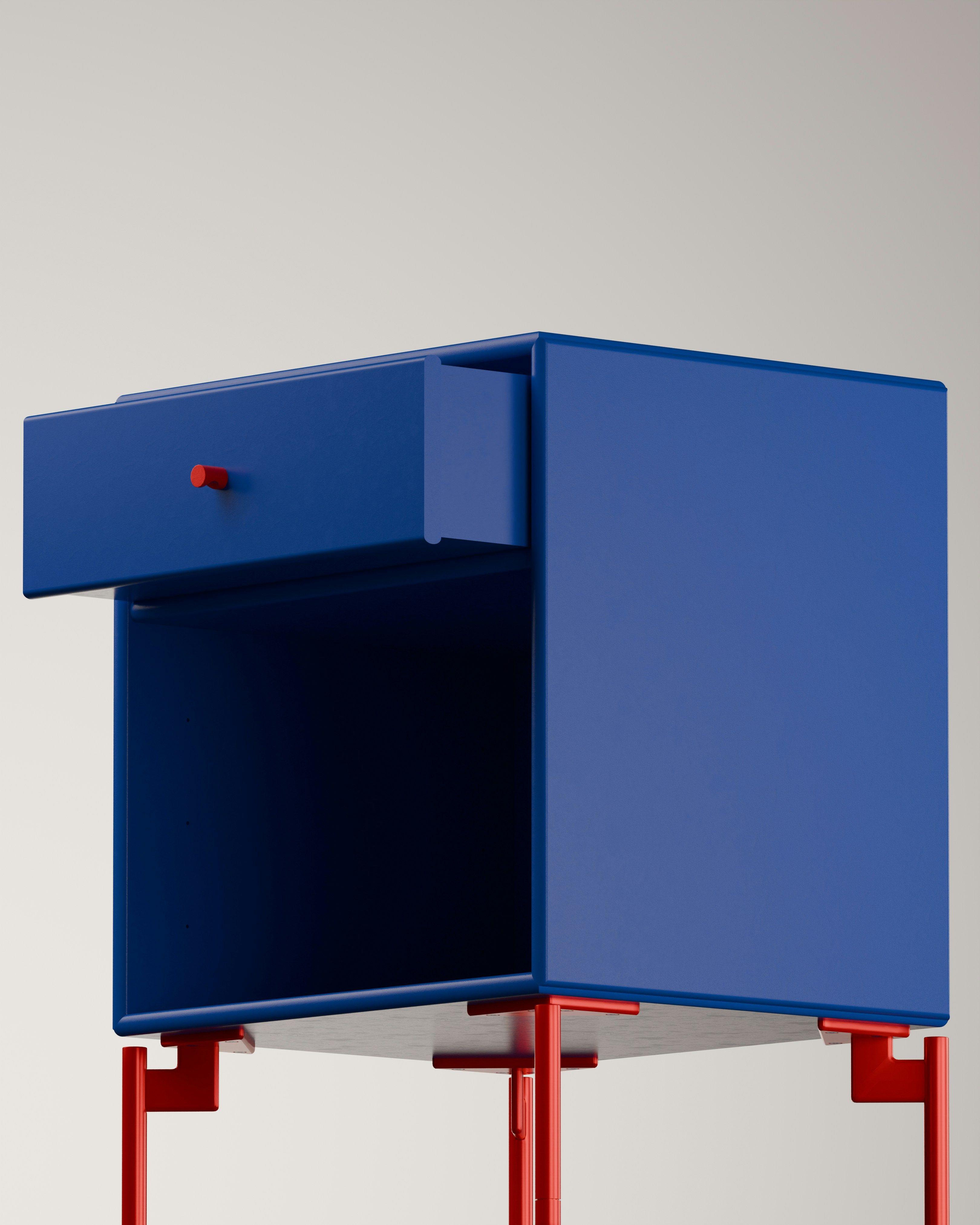 Cobalt blue modular cabinet with an open drawer
